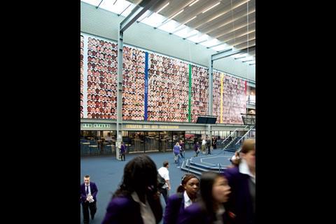 A large portrait wall gives students a sense of belonging